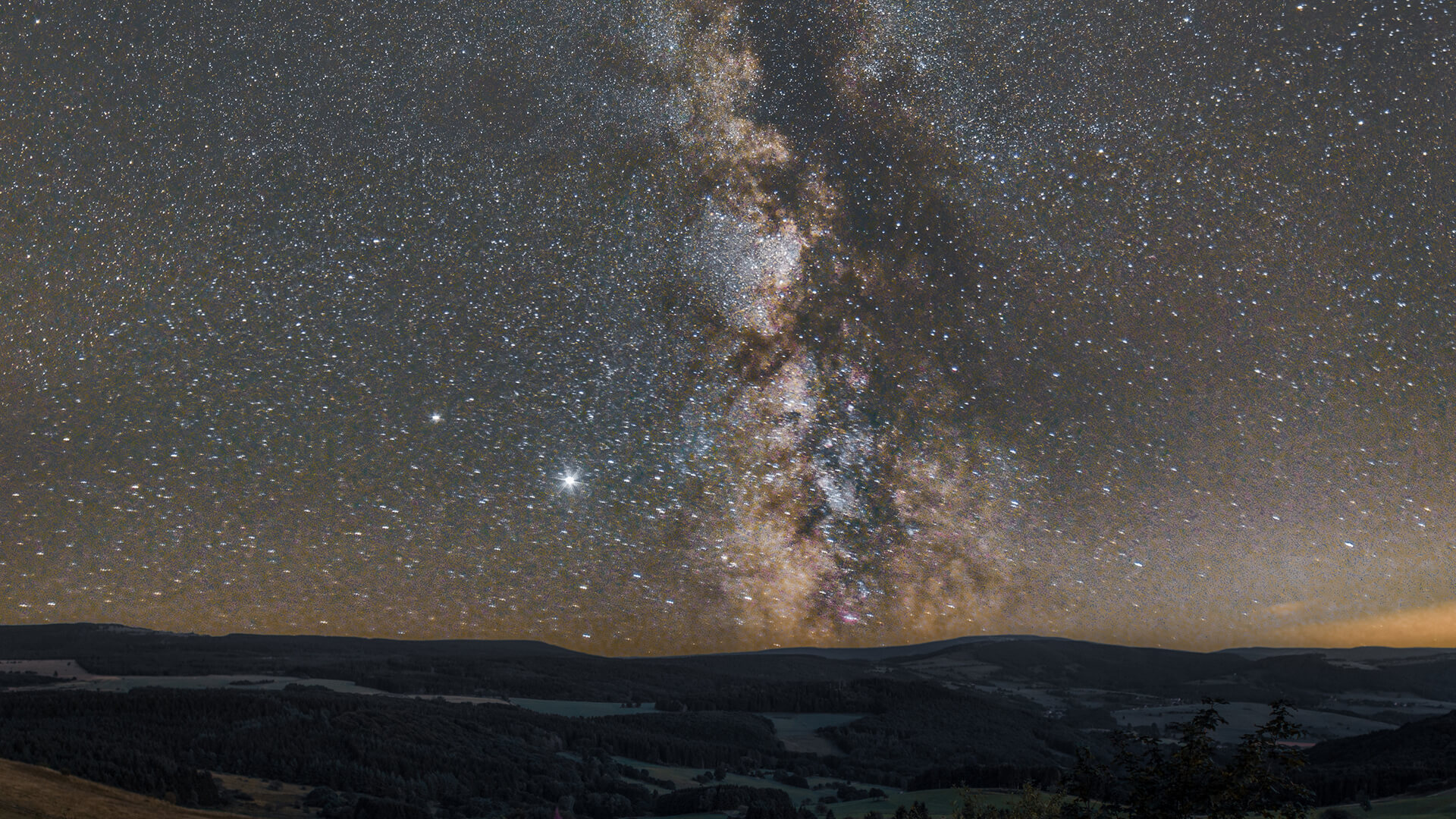 Gersfeld: Starry sky with the Milky Way over the Wasserkuppe